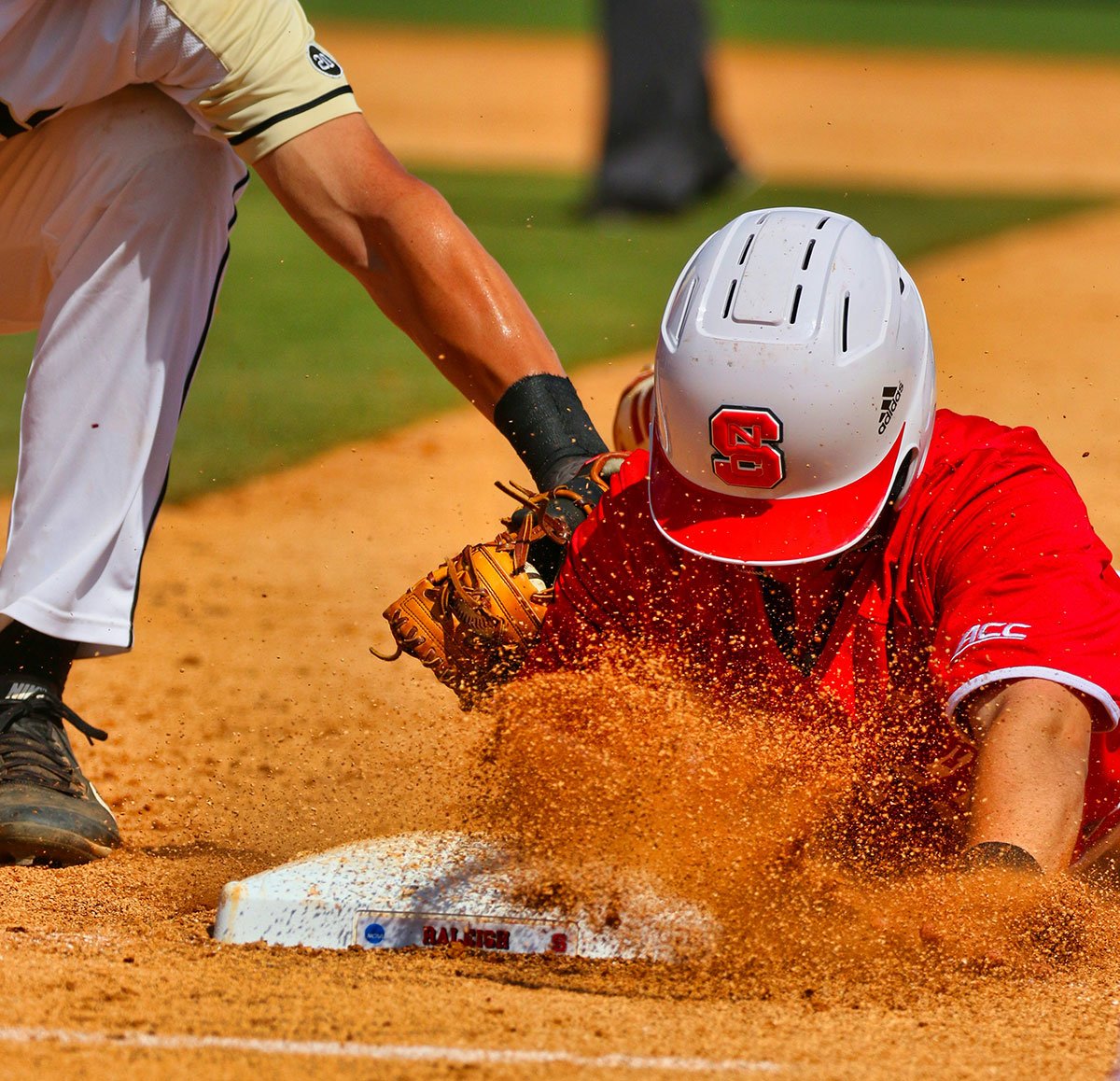 two boys playing baseball